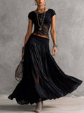 Geneva · Conjunto con Top Trasparente y Inserti en Encaje Negro y Falda Maxi plisada